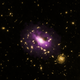 Illustration for article titled This image reveals the extreme power of a single black hole